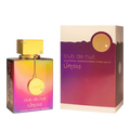 Colorful perfume bottle and packaging labeled 'club de nuit Untold' on a white background