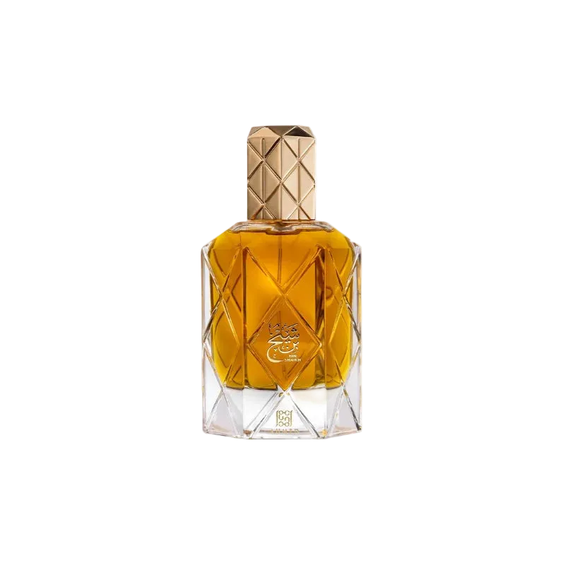 Perfume bottle with geometric design and gold cap on a white background
