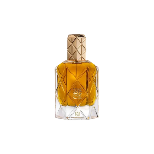 Perfume bottle with geometric design and gold cap on a white background